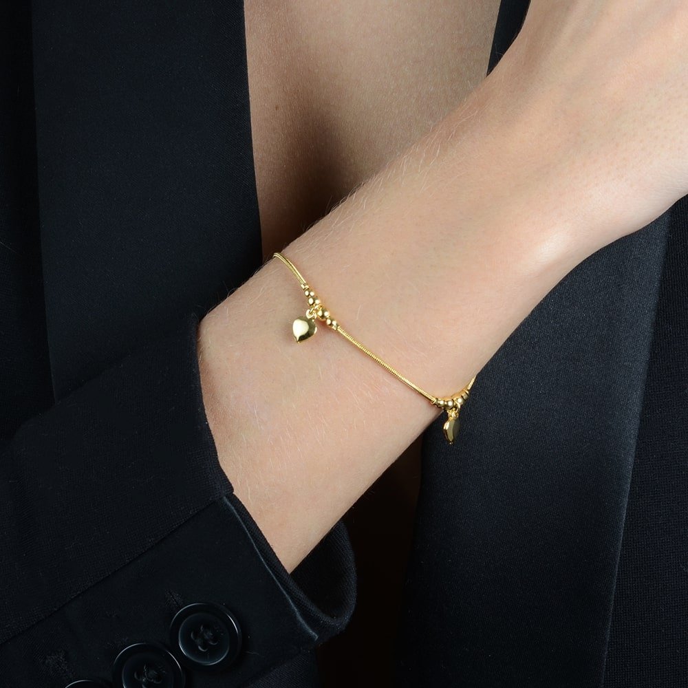 Pulseira Dourada Lisa com 3 Pingentes de Coração - Pulseiras | Helennea